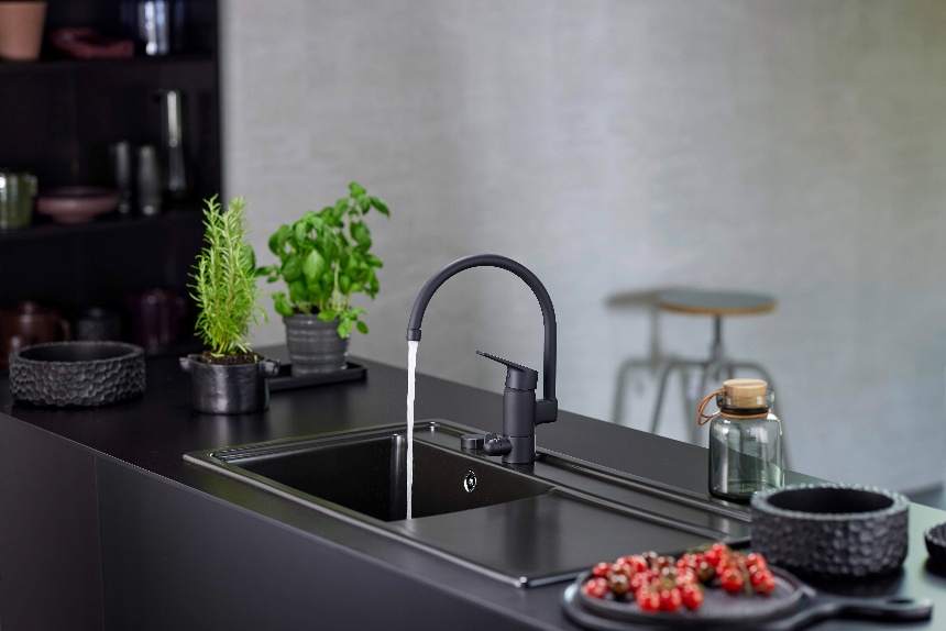 Oras Vega matt black kitchen faucet that saves water and energy